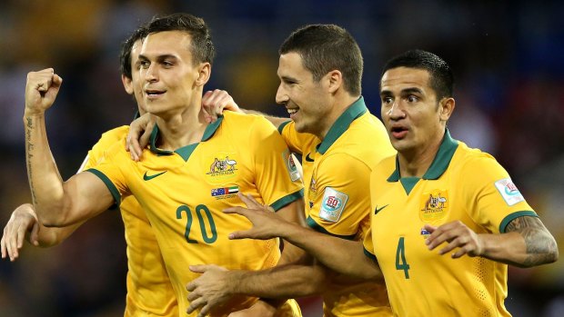 Golden: The Socceroos celebrate Trent Sainsbury's goal against the UAE.