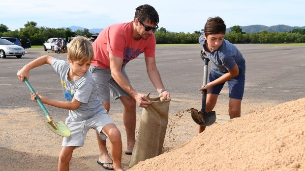 Townsville residents fill sandbags in preparation for Cyclone Debbie in March.