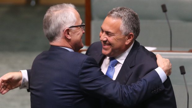 Prime Minister Turnbull embraces former treasurer Joe Hockey after his valedictory speech on Wednesday.