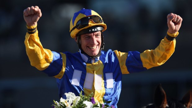 Champion: Richard Hughes celebrates after winning the Juvenile Fillies Turf in 2013.