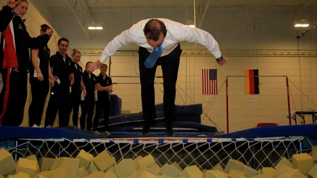 Tony Abbott demonstrating how to do a flip. 