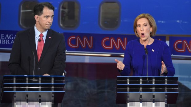 Coming and going: the second Republican debate hosted by CNN spelled the end for Walker (left) but provided Carly Fiorina (right) with a boost.