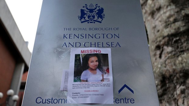 A sign is displayed outside Kensington town hall as protestrrs gathered demanding answers over the Grenfell Tower fire.