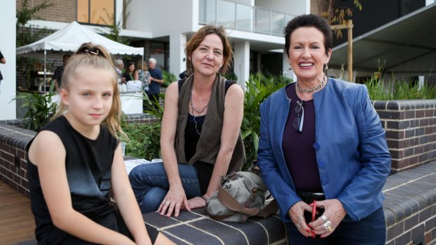 Clover Moore with Vanessa and Annemiek Owens at a welcome party for the first residents to move into the Green Square town centre. 