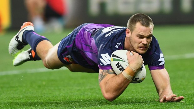 Too good: Melbourne Storm's Cheyse Blair dives in to score.