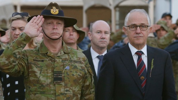 Malcolm Turnbull attends an Anzac Day ceremony at Australia's main base in the Middle East.
