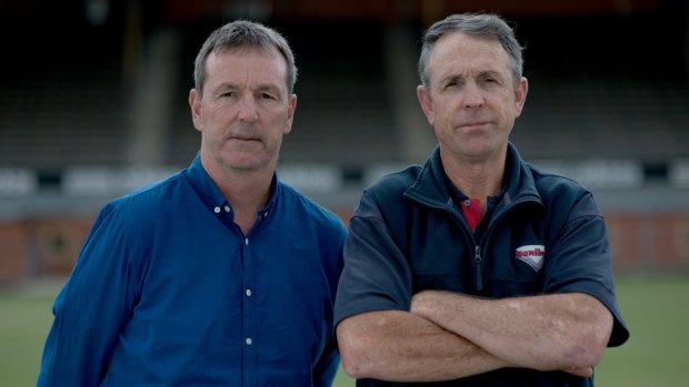 Standing firm: Neale and Terry Daniher show their committment to the Bombers.