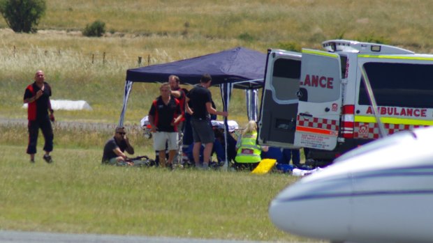 A 14-year-old boy is treated after a skydiving accident at Goulburn airport on Saturday.