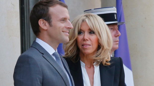 French President Emmanuel Macron, left, his wife Brigitte Macron at the Elysee Palace in Paris.