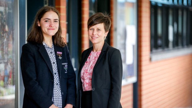Melbourne Girls' Colllege co-captain Laura Bass with Senate inquiry chairman Senator Jenny McAllister. 