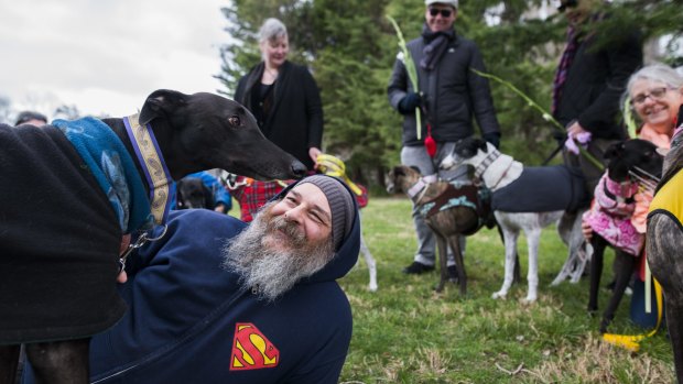 Darren Bulmer with his rescue greyhound Bentley. 