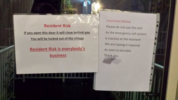 A sign about a faulty buzzer. Mat