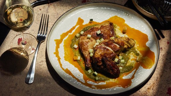 Roasted chicken with green nam jim and annatto oil at New Quarter.