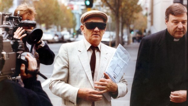 Disgraced priest Gerald Ridsdale outside court with then Archbishop of Sydney George Pell, in 1993. 