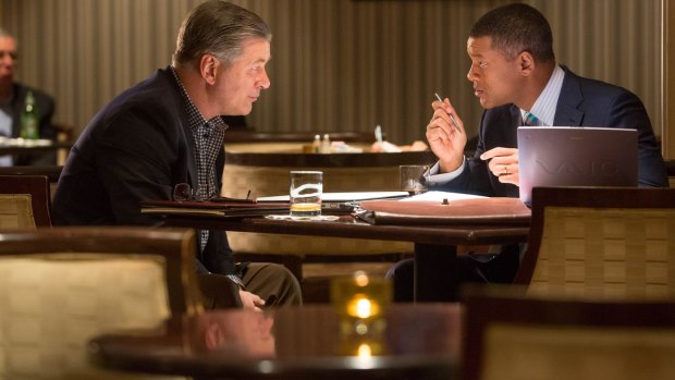 Ill-served: Alec Baldwin and Will Smith play reluctant allies in <i>Concussion</i>.