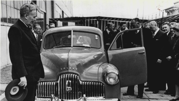 Ben Chifley with the first Holden in 1948.