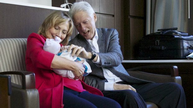 Hillary and Bill Clinton with their granddaughter, Charlotte Clinton Mezvinsky.