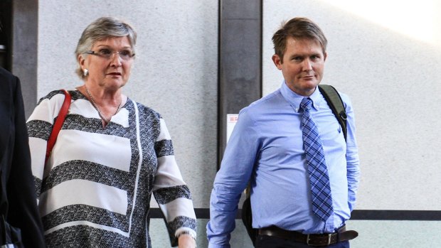 Mother and son witnesses BQS and BQR, whose names are suppressed but faces are allowed to be shown, leave the first day of the Royal Commission into Institutional Responses to Child Sexual Abuse.