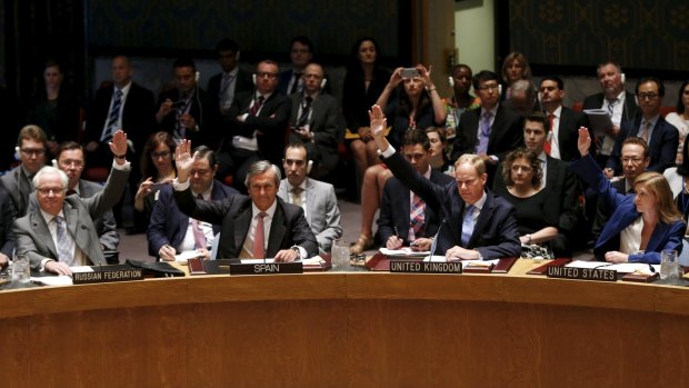 Ambassadors from Russia, Spain, UK and the US vote on the UN Security Council resolution that will pave the way for the lifting of UN sanctions on Iran.