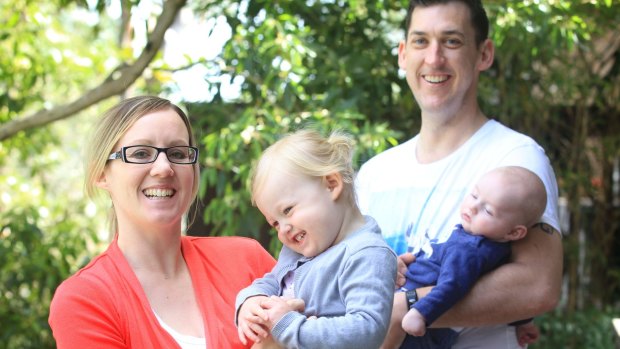 Kate Wild with her children Poppy (aged 2) and William (aged 3 months) and her husband Brendon at their Westleigh home.