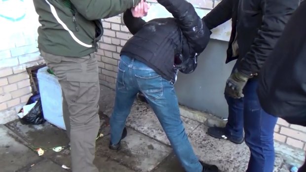 A video grab provided by the RU-RTR Russian television on Friday reportedly shows Federal Security Service operatives detaining a suspected member of Islamic State's cell in St Petersburg.
