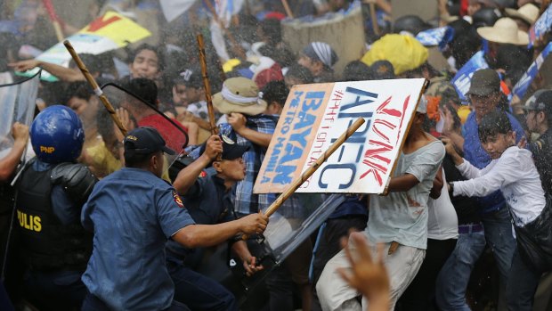 Police fire water cannons at student activists in Manila last year. 