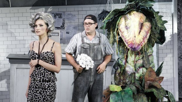 Esther Hannaford, Brent Hill, and Audrey II in Little Shop of Horrors.