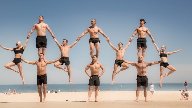 Members of Cirque du Soleil at Port Melbourne Beach.