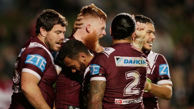 Fired up: Nathan Green celebrates scoring a try with teammates during the round 17 NRL match between the Manly Sea Eagles and the St George Illawarra Dragons at Brookvale Oval.
