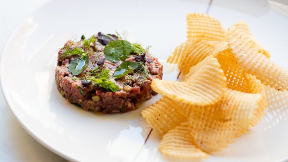 Hand-chopped beef tartare is available at lunch.