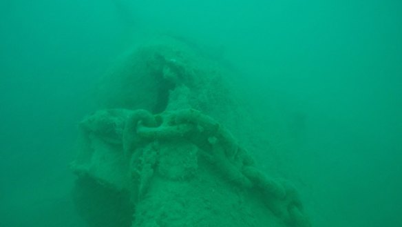 The starboard anchor chain. The chain has been cut and the anchor removed some time ago. 