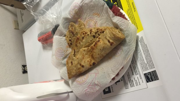 A half-open packet of flat bread.