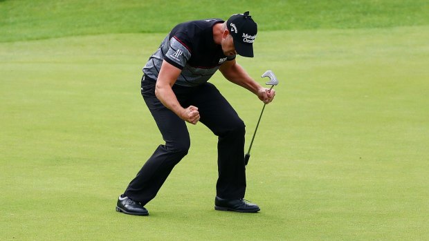 Henrik Stenson celebrates his British Open victory after his final putt at Royal Troon on Sunday.
