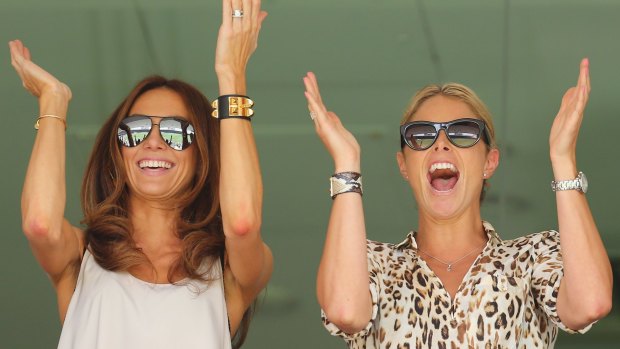 WAGs: Kyly Clarke and Candice Falzon, pictured in Brisbane in 2013.