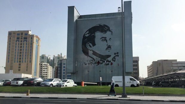 The face of the Emir on a building in Doha, Qatar. Qatari are showing solidarity with the government for withstanding the pressure of the blockade. 