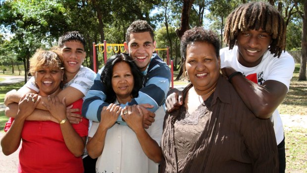 Mothers and sons: a young Nic with Atetha  (right) grew up in the same street as  Michael Walters and his mother Martha Penny (left) and Chris and Debbie Yarran.