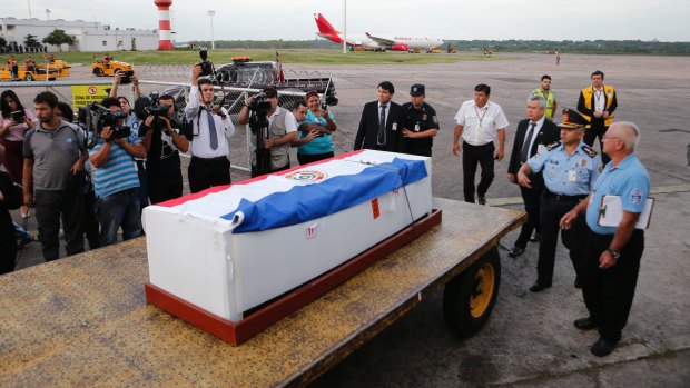 The body of Paraguayan Gustavo Encina, who died in Monday's plane crash, arrives at Silvio Pettirossi airport in Luque, Paraguay on Friday. Encina was a member of the plane's crew.
