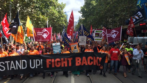 Thousands of workers rallied in Melbourne and around the country against an Abbott government inquiry into workplace relations.