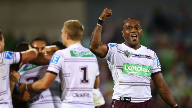 Four for the good: Akuila Uate celebrates the win over the Rabbitohs.