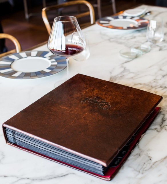Wine lists range from one page to hefty leather-bound tones, like Ten Minutes by Tractor's list.