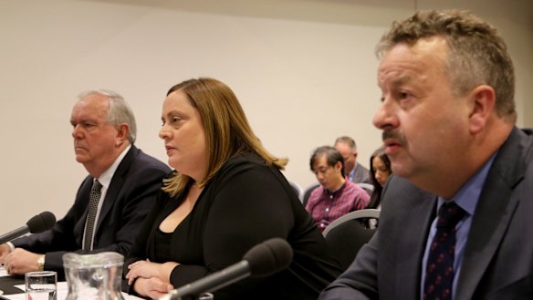 7-Eleven founder and former chairman Russ Withers, left, and former general manager operations Natalie Dalbo faced a Senate grilling.