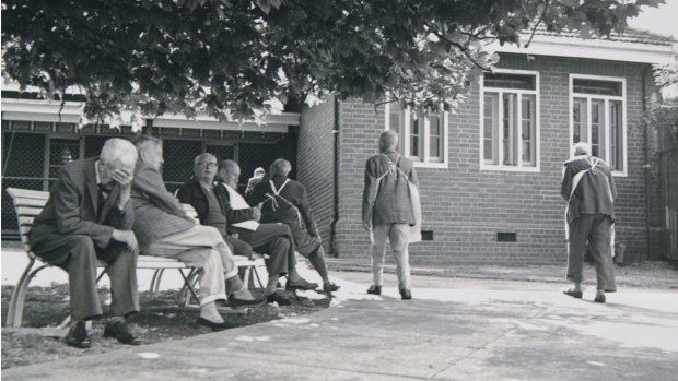 Pat Campbell (third from left), in a courtyard of the Bundoora Repatriation Mental Hospital in 1970.