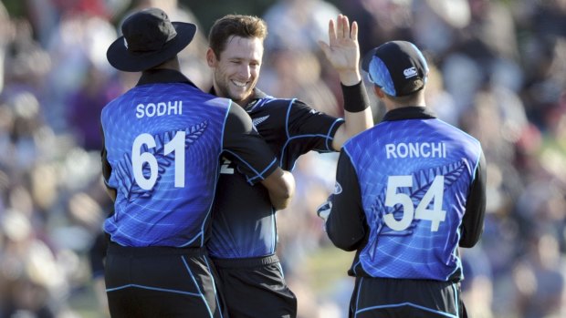 New Zealand's Matt Henry celebrates a five-wicket haul after dismissing Sri Lanka's Dinesh Chandimal for a duck.