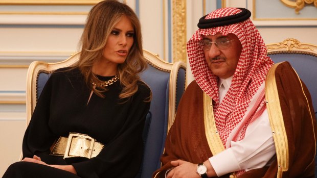 Melania Trump talks with Saudi Crown Prince Muhammad bin Nayef. Her appearance was no different to Michelle Obama's two years ago.