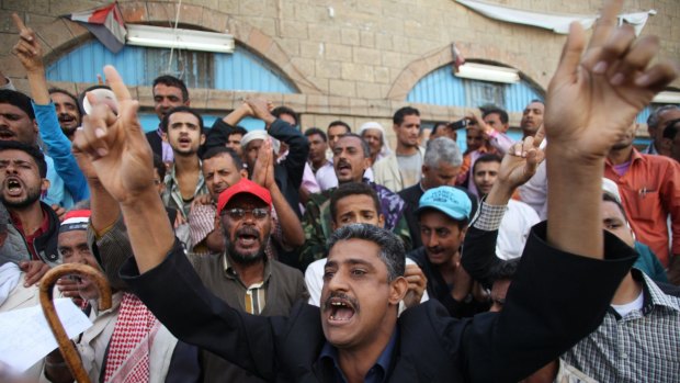 Anti-Houthi protesters during a demonstration against the Shi'ite Muslim militia group in the south-western Yemeni city of Taiz on Sunday. 