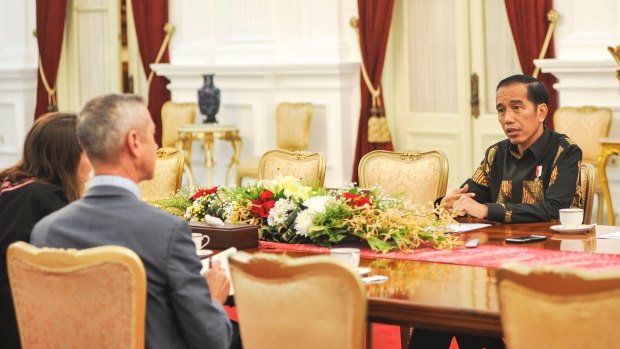 Indonesian President Joko Widodo being interviewed by Indonesia correspondent Jewel Topsfield and international editor Peter Hartcher at the presidential palace in Jakarta. 