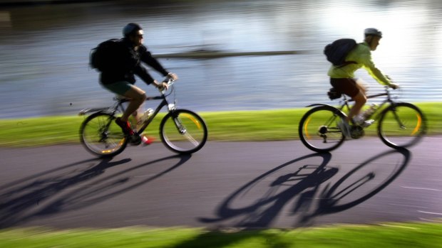Canberra's cyclists will not be forced to carry ID despite NSW mandating it from March 2016. 