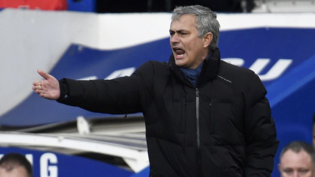 Special advice: Chelsea manager Jose Mourinho reacts during the Blues' clash with Newcastle United at Stamford Bridge on January 10.