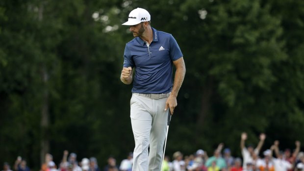 Dustin Johnson celebrates on the 15th hole during his final round.