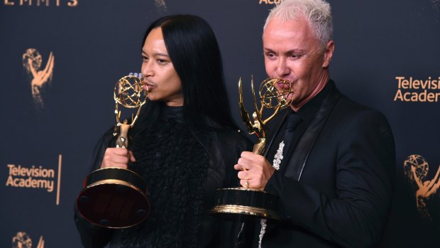 Zaldy Goco and Australian Perry Meek, right, pose with the award for Outstanding Costumes for a Variety, Nonfiction, or Reality Programming